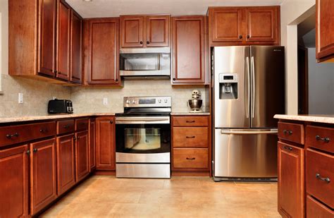 wood cabinets stainless steel appliances|lightweight kitchen cabinets.